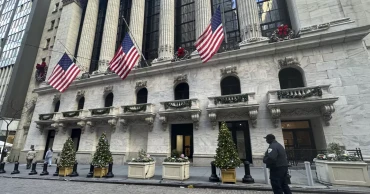 Asian markets are mixed after Wall Street edges back from its record