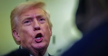 Trump says he did not see racist clip showing Obamas as apes