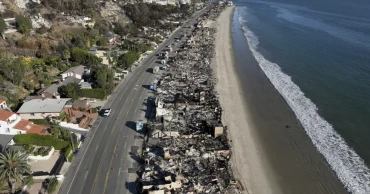 Windy, flame-fanning weather eases up as progress made on LA-area fires