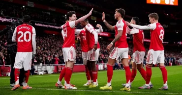 Arsenal extends lead at top as Man City draws with Forest