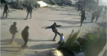 Video shows armed men beating a Palestinian in Israeli-occupied West Bank