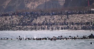 Thousands breach Morocco-Spain border into Ceuta in ‘absolute chaos’