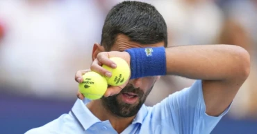 Djokovic rallies past qualifier to reach US Open 3rd round