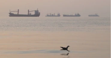 Iran says three oil tankers hit mines in Strait of Hormuz