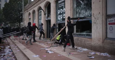 Paris imposes overnight curfew in two areas after widespread rioting