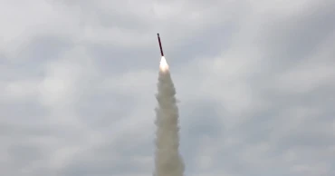 North Korea hails cruise missile tests as Trump arrives in South Korea