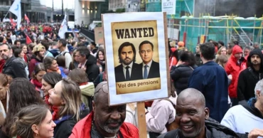 Tens of thousands protest austerity in Brussels, police use tear gas