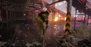 Ukraine says drone attacks hit Russian warehouse as cross-border strikes kill several