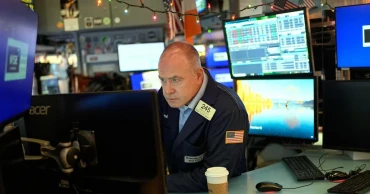 Asian shares mixed as US stocks hit more records