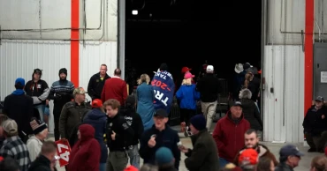 Trump leaves Michigan rallygoers waiting in the cold for hours to tape Joe Rogan podcast