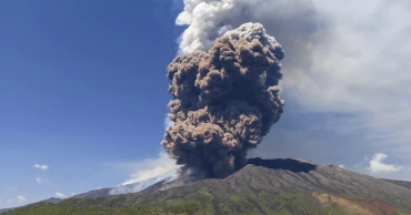 Sicily's Mount Etna erupts with columns of smoke and ash