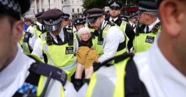 UK to impose restrictions on repeated protests after 500 arrests at pro-Palestinian vigil