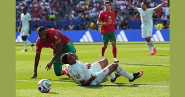 Mbappé scores his 8th World Cup goal before leaving game with a 'slight' ankle injury