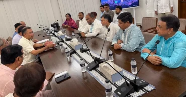 PM hands over Eid bonus cheques for city corporation conservancy workers