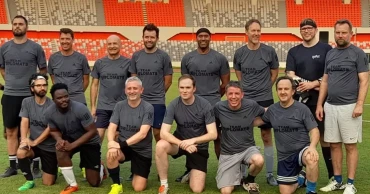 Sport unites: Advisers, diplomats play friendly football match  