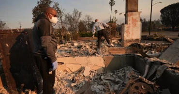 12,000 structures destroyed, 11 dead, thousands displaced in devastating blaze