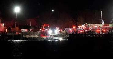 Passenger jet with 60 aboard, army helicopter collide while landing at Reagan airport in US