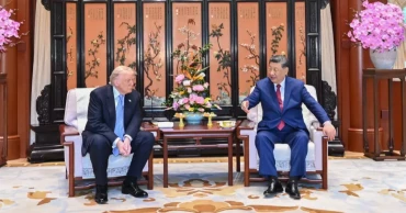 Xi, Trump hold private meeting in Beijing