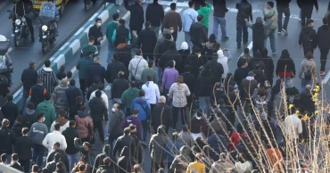 Iran Revolutionary Guard volunteer killed amid widening economic protests