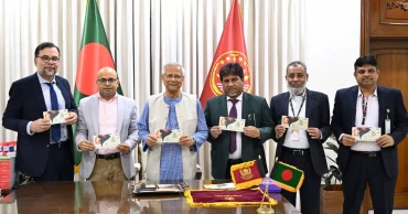 Prof Yunus unveils Victory Day stamp