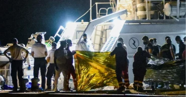 Italian coast guard recovers 14 more bodies of shipwreck victims off Calabria, dozens still missing