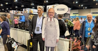 Profit drops at Warren Buffett's firm but thousands still want to hear from the investing guru