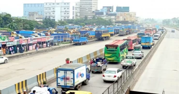 Dhaka-Ctg highway sees long tailback as workers block road demanding dues