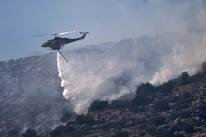 Wildfire near Athens triggers evacuations amid heat wave
