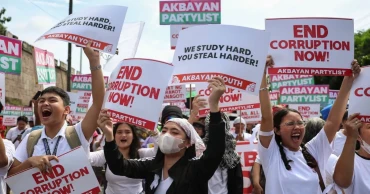 Philippine police arrest 17 amid mass anti-corruption protests