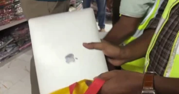 Stolen laptop of German tourist  recovered in Natore, shop employee held