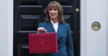 UK's Treasury chief set to raise taxes once again in a high-stakes second budget