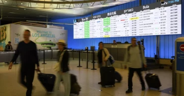 Trump’s new travel ban takes effect as tensions escalate over immigration enforcement