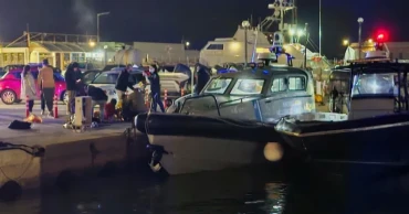 Greek rescuers search for missing after migrant boat collision kills 15