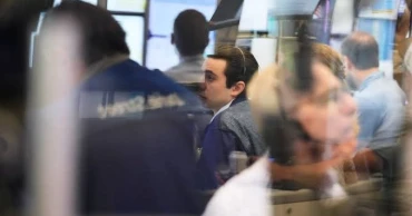Asian shares mostly rise as AI optimism offsets Iran war concerns