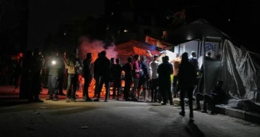 38 Palestinians killed in new shootings near food distribution centers, medics say