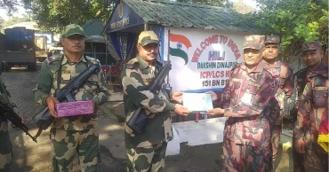 BGB and BSF exchange sweets at Hili border to mark Victory Day