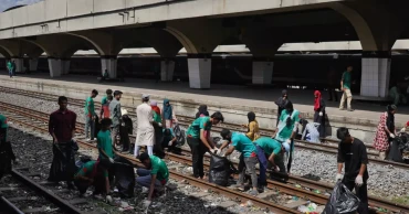 Young volunteers clean up waste from Kamalapur railway track