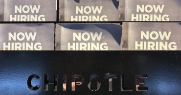 US applications for jobless benefits fall to 213,000, remaining near 7-month lows