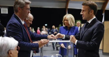 France is voting in a key election that could force Macron to share power with the far right