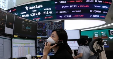 Asian shares mixed after Wall Street gains, oil prices rise