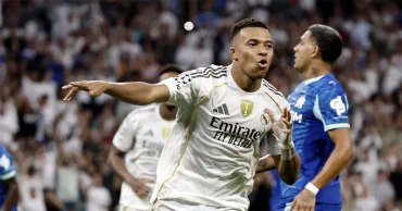 Mbappe’s double penalties lift 10-man Real Madrid past Marseille