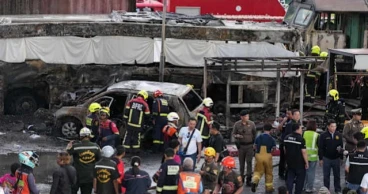 Cargo train crashes into bus in Bangkok, killing 8
