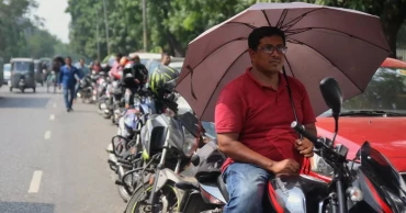 Even after price hike, fuel stations in Dhaka see long queues under intense heat