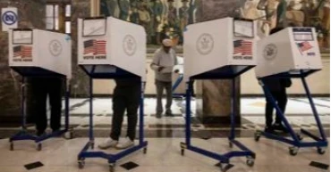 Election Day voting unfolds generally smoothly with some scattered issues and delays