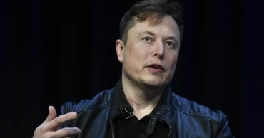 Tesla shares jump as Musk buys $1B stake ahead of shareholder vote on record pay package