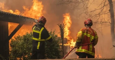 Over 300,000 evacuated as wildfires rage across France and Spain