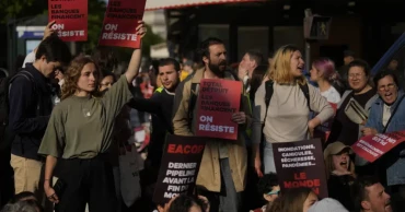 Climate protesters face tear gas at oil major TotalEnergies shareholder meeting in Paris