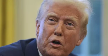 Trump imposes tariffs on Canada, Mexico and China, spurring prospect of inflation and trade conflict