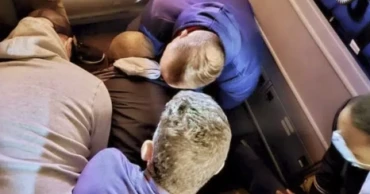How passengers teamed up to restrain man on chaotic flight