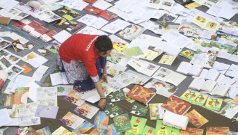 Rain hits Ekushey book fair hard; huge books damaged
